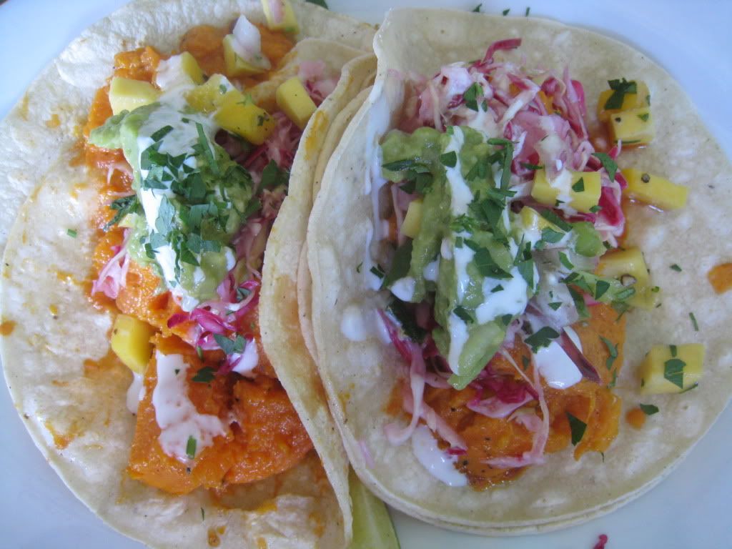 Weird Fish veggie tacos with sweet potato, mango salsa, slaw, vegan crema