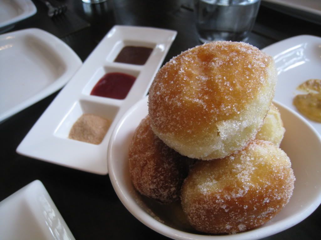 Madison donut-like beignets with chocolate, cinnamon sugar, and berry sauce