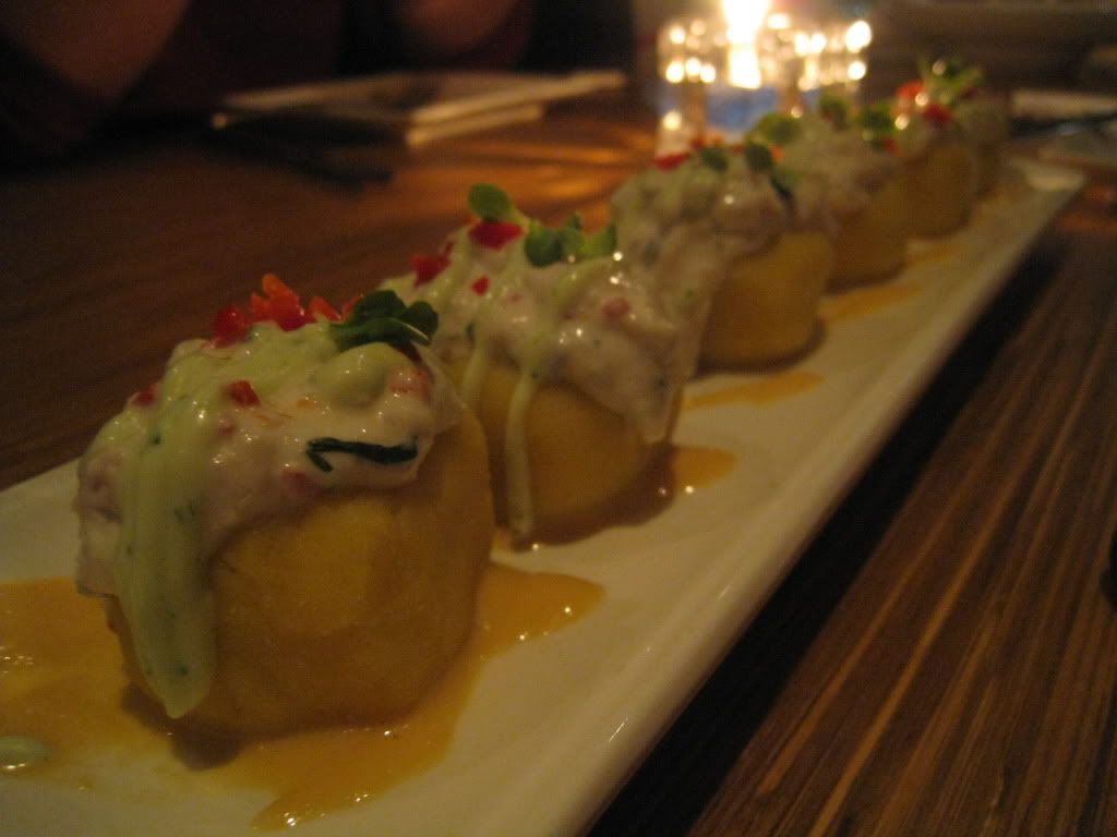 Potato Causa with Crab meat and Peruvian red chili sauce