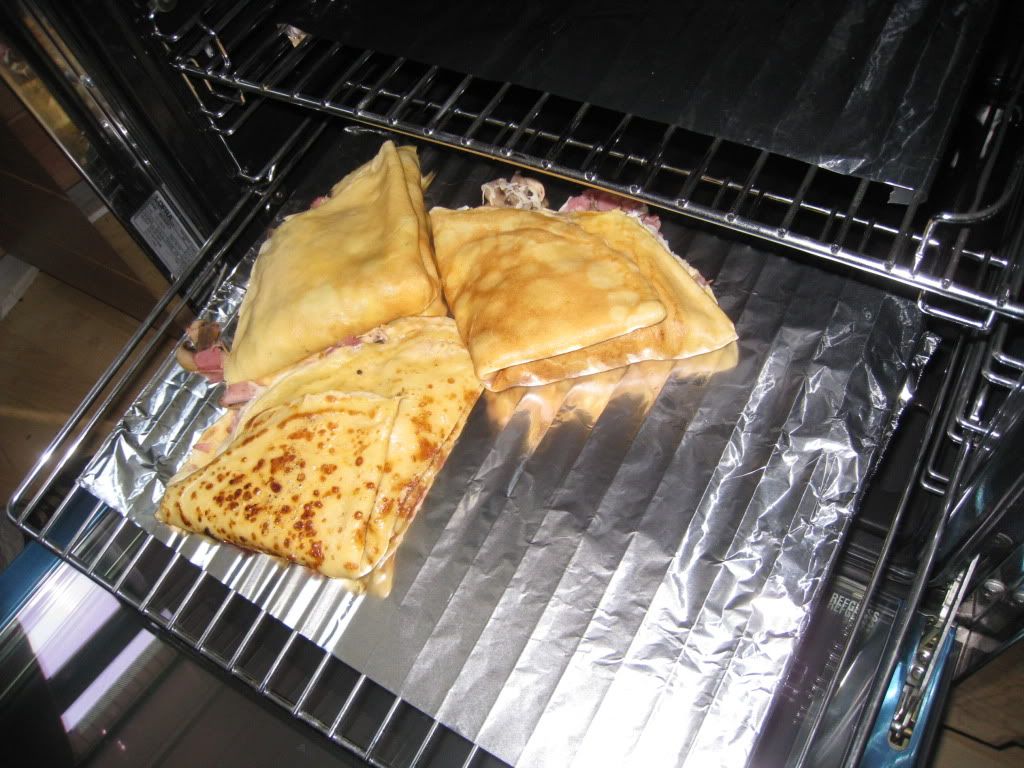 Crepes keeping warm in the oven