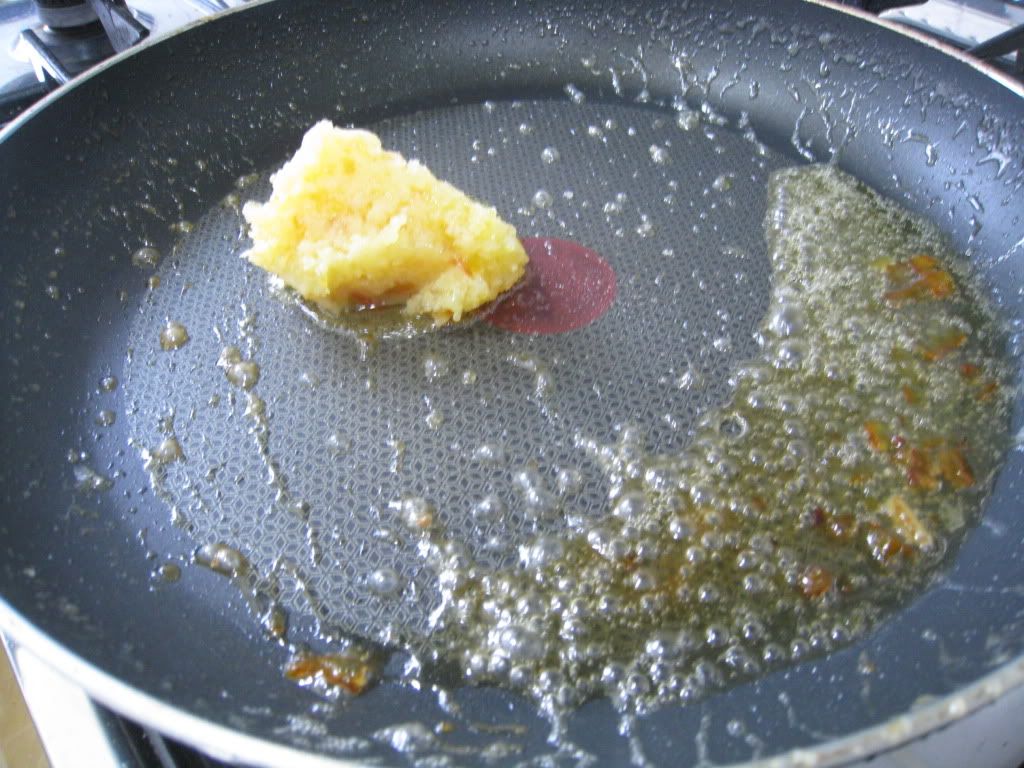 Orange butter melting in the pan