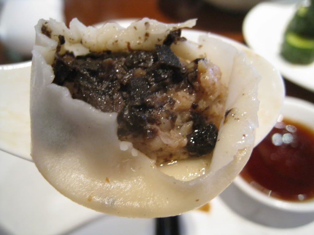 Inside of Din Tai Fung's black truffle and pork xiao long bao