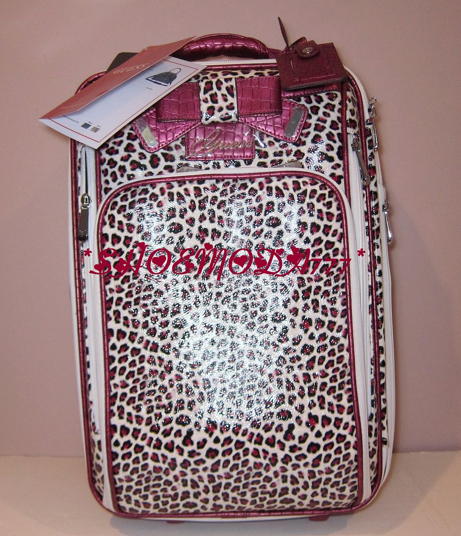 guess suitcase pink