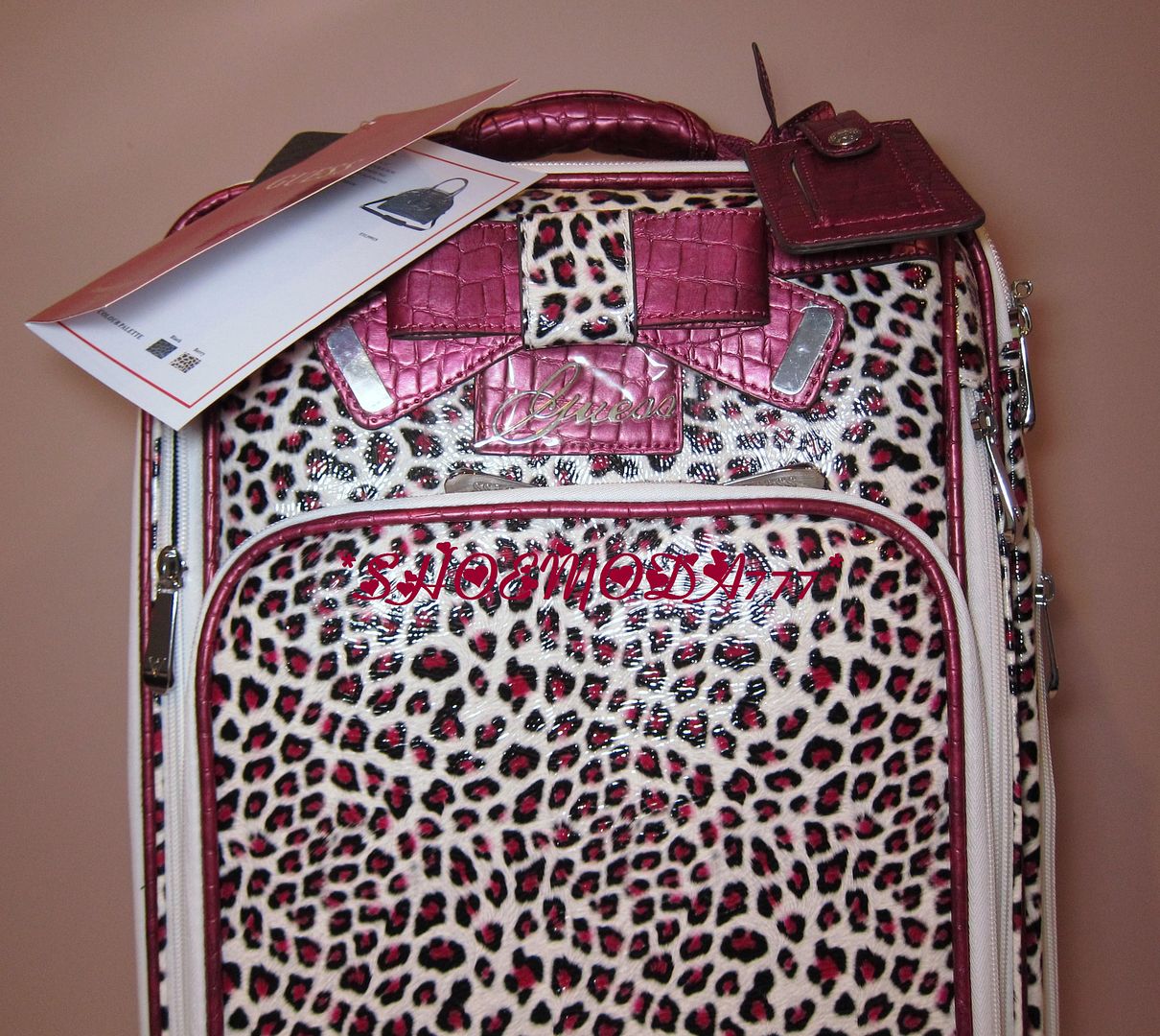 guess suitcase pink