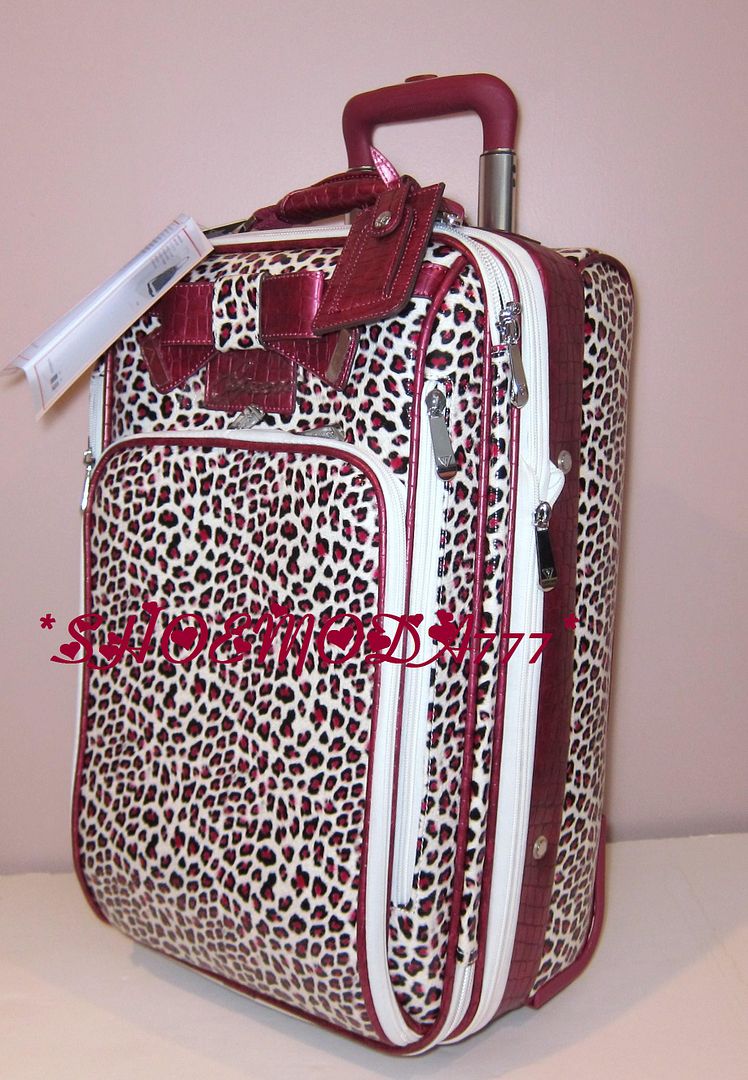 guess suitcase pink