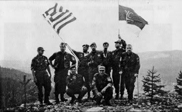 greek_volunteers_raising_flag_after_fall_of_srebrenica.jpg