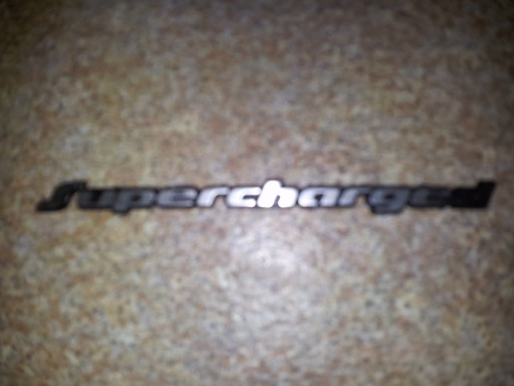 Superchargedbadge.jpg