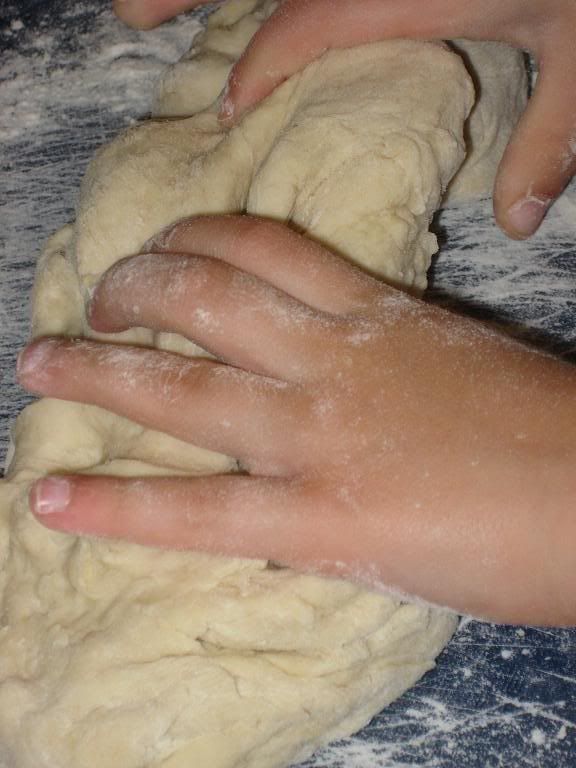 Z kneading the dough.