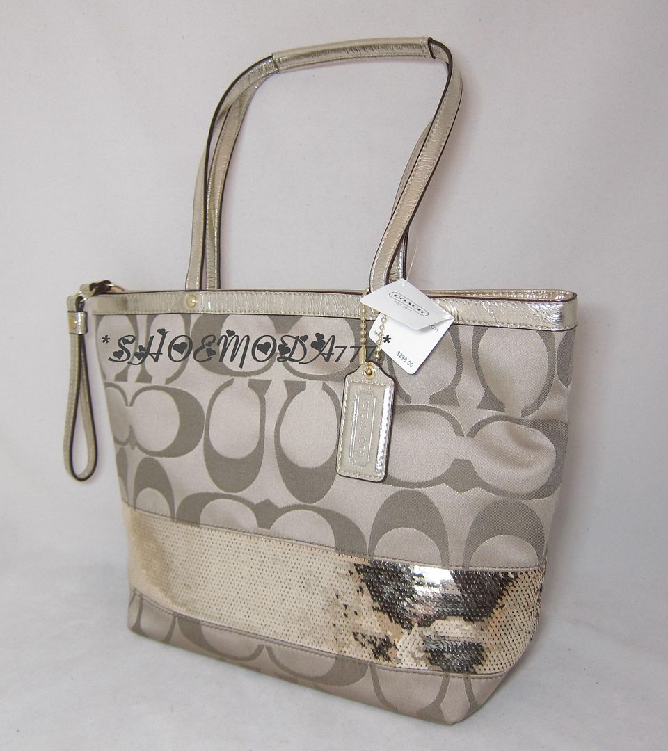 Tote m ade of signature canvas and leather trim and handles