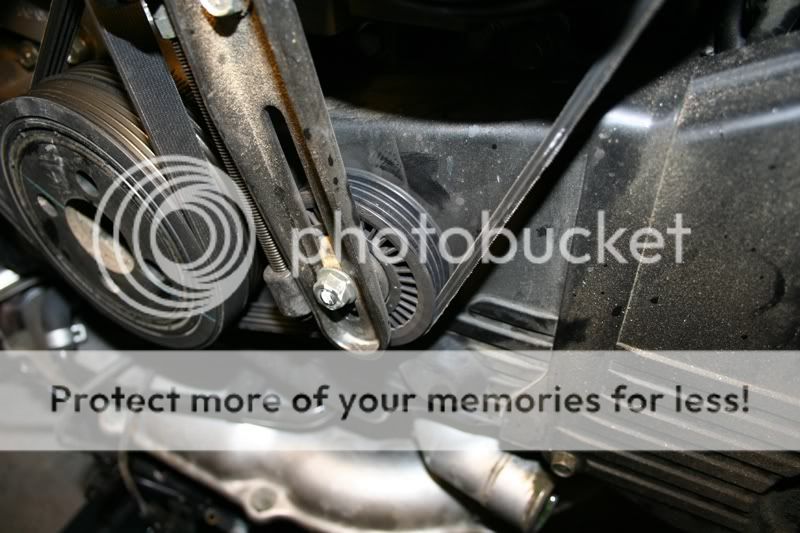 Removing AC Compressor. Does the small lower pulley run anything